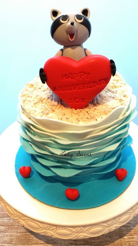 A Racoon Beach Ruffled Wedding Anniversary Cake
